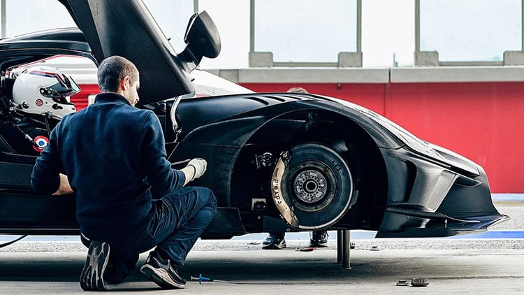 carbon fiber brake pads installation process on luxury sports car brake system