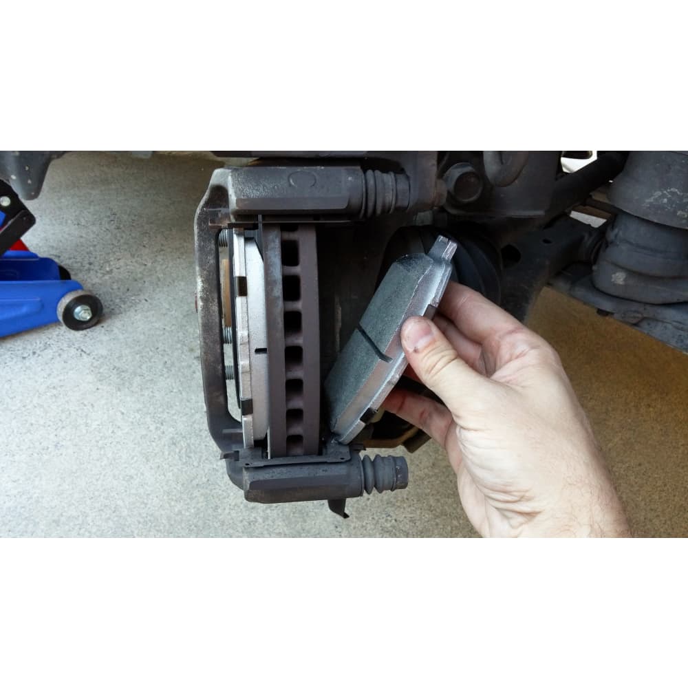 brake pad installation process professional mechanic