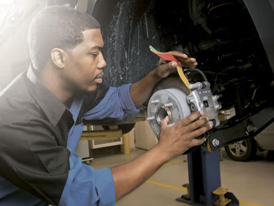 professional mechanic brake pad installation